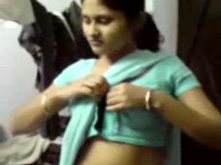 Gallery 987 Bhabhi opening her blouse to show off her large
